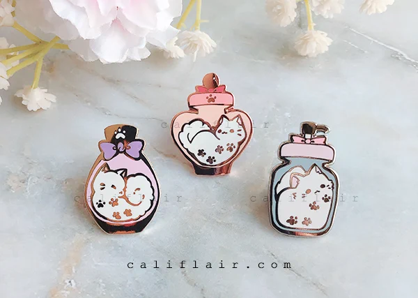 cats are liquid ?? 

purrfume kitty pins finally arrived!! you can adopt them now at my store (US only for now)

? https://t.co/8W2tUT5LGz ? 