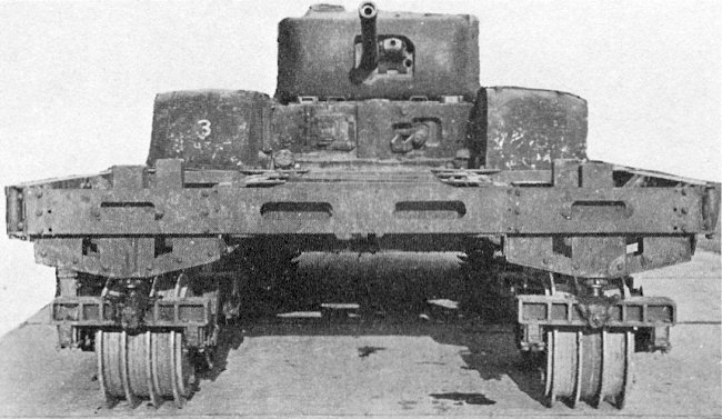 Oh all right...This thing here is a Churchill tank fitted with the unimprovably named "Canadian Indestructible Roller Device". The idea is that mines go bang under the wheels in front instead of the tank. This was apparently greatly preferred by the crew.