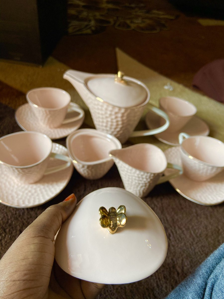 TeaHaven1's tweet photo. Pink butterfly detail tea set - 1500ml teapot, four 250ml tea cup set, one milk jug and a sugar bowl N36,000 https://t.co/tU2NwrPfXF