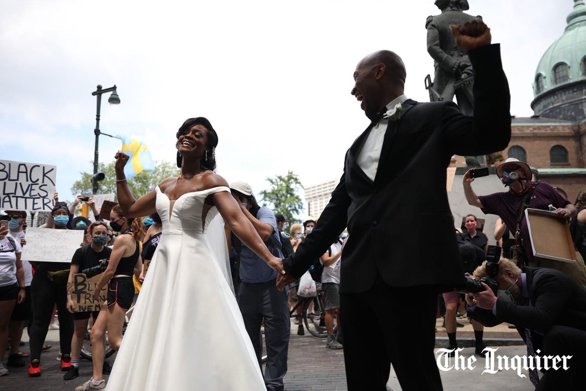 The protest along the Benjamin Franklin Parkway briefly turned into a wedding party Saturday afternoon, as Kerry Anne and Michael Gordon joined the march on their wedding day.

📸 by Tyger Williams

More: inquirer.com/news/george-fl…