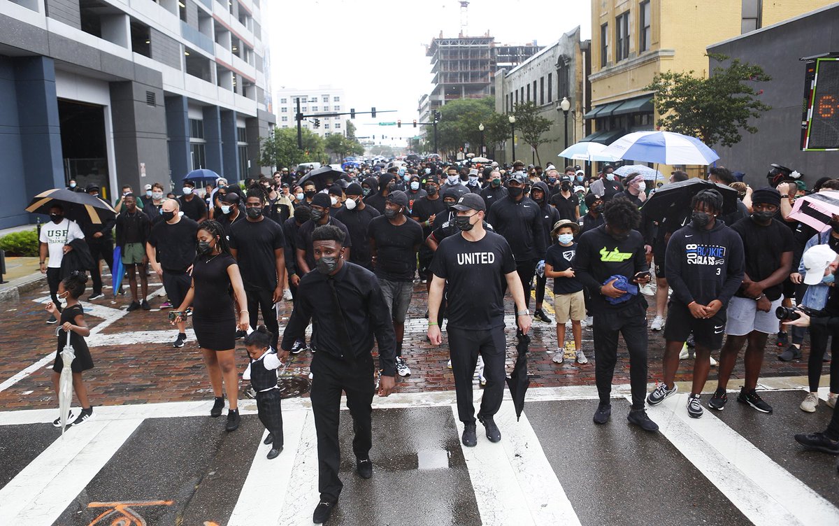 coach_jeffscott's tweet photo. Words can’t describe how proud I am of @KJ2LiVE and our @USFFootball team as we participated in the Unity Walk today. It is this younger generation that is leading the way in the battle to end racial injustice and racial inequality‼️ #United #BlackLivesMatter ✊🏿✊🏾✊🏽✊🏼✊🏻 https://t.co/RJAHIE0YwV