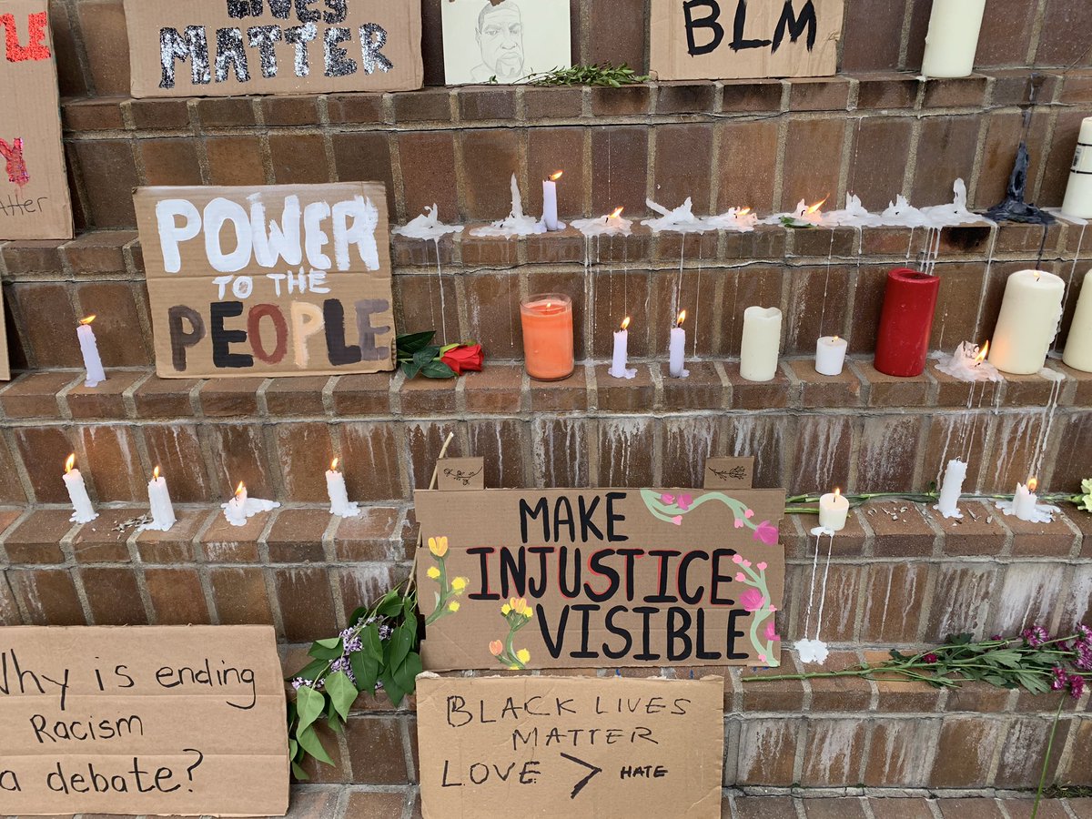 alanna_smithh's tweet photo. Most people have left the plaza now, but a vigil remains with a sketched photo of #GeorgeFloyd, signs in support of #BlackLivesMatter and candles. #yyc #yycprotest https://t.co/zcSCegI9oY