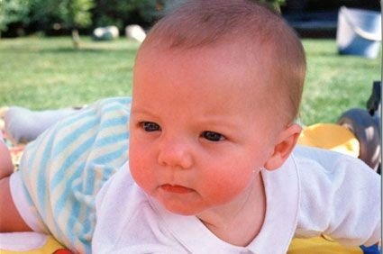 Louis tomlinson as a baby but as you slide down he grows up and you feel proud; a thread.