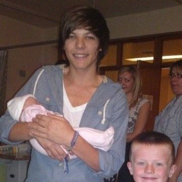 Louis tomlinson as a baby but as you slide down he grows up and you feel proud; a thread.