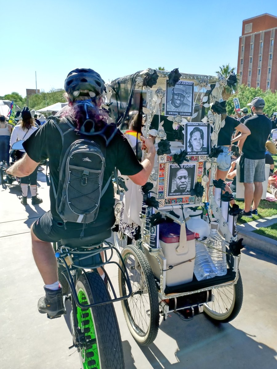 Lifeiskaotic's tweet photo. Bike cart made by a supporter/protestor at the peacful #TucsonProtest /Rally held at the #UofA today https://t.co/pmaldgV9Nk