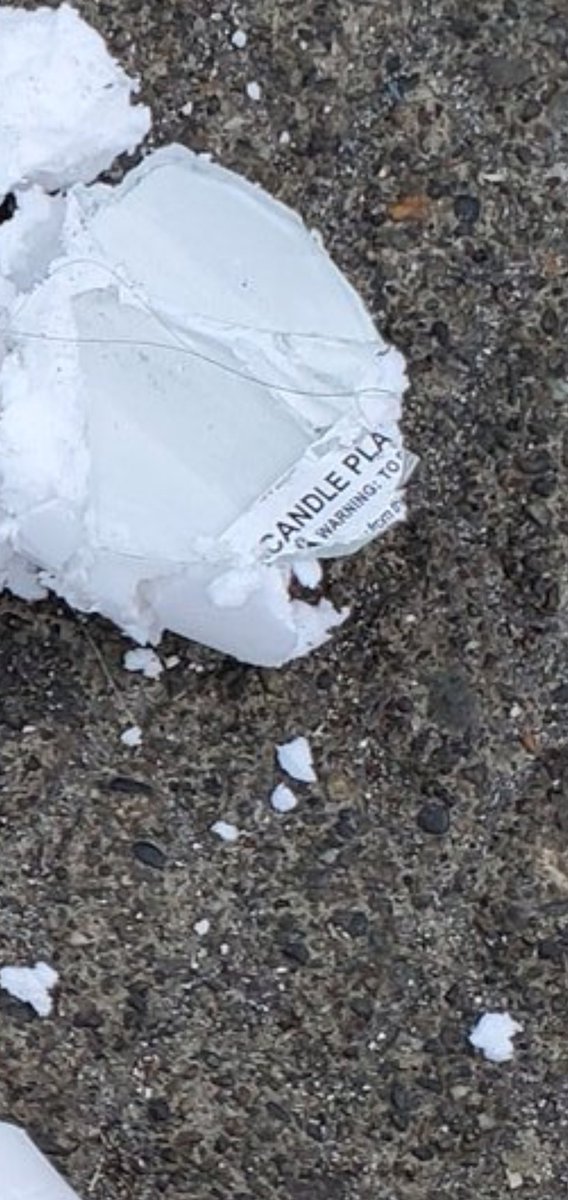 rajputam's tweet photo. @SeattlePD @KING5Seattle It's your responsibility to fact check. And if you show something that is visibly inaccurate, you need to report on it. That photo, simply zoom in and you can see that's a candle https://t.co/7SZFVnj18p