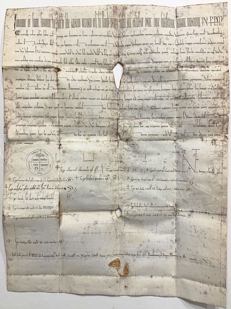 incunabula's tweet photo. A Privilege of Pope Innocent II, dated 23rd April 1141; written in a fine littera documentaria Pontificalis with decorative elaboration of ascenders &amp; descenders and the standardized eschatocol of the early 12th century Papal Chancery, with Innocent's rota and bene valete.  1/2 https://t.co/L68l6XYLjc