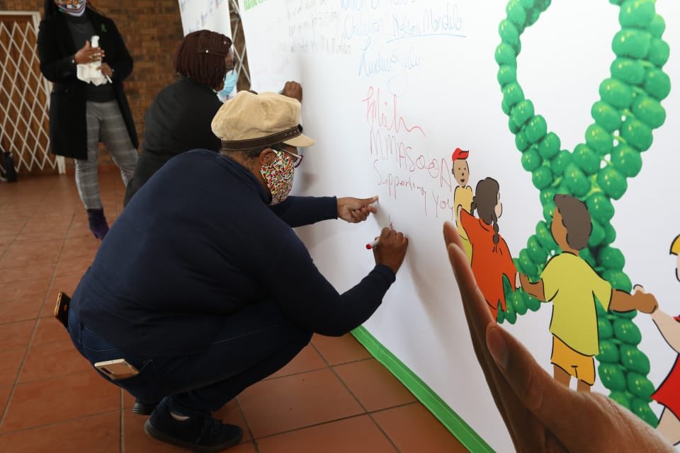 The_DSD's tweet image. "As we sign this pledge, we are committing to protecting children, and by wearing the green ribbon, which represents life and growth, we are showing that we care and support Child Protection Week." #ChildProtectionWeek2020
