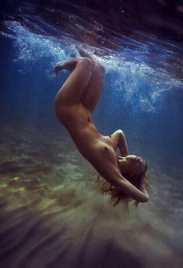 Naked girls swimming nude in the water