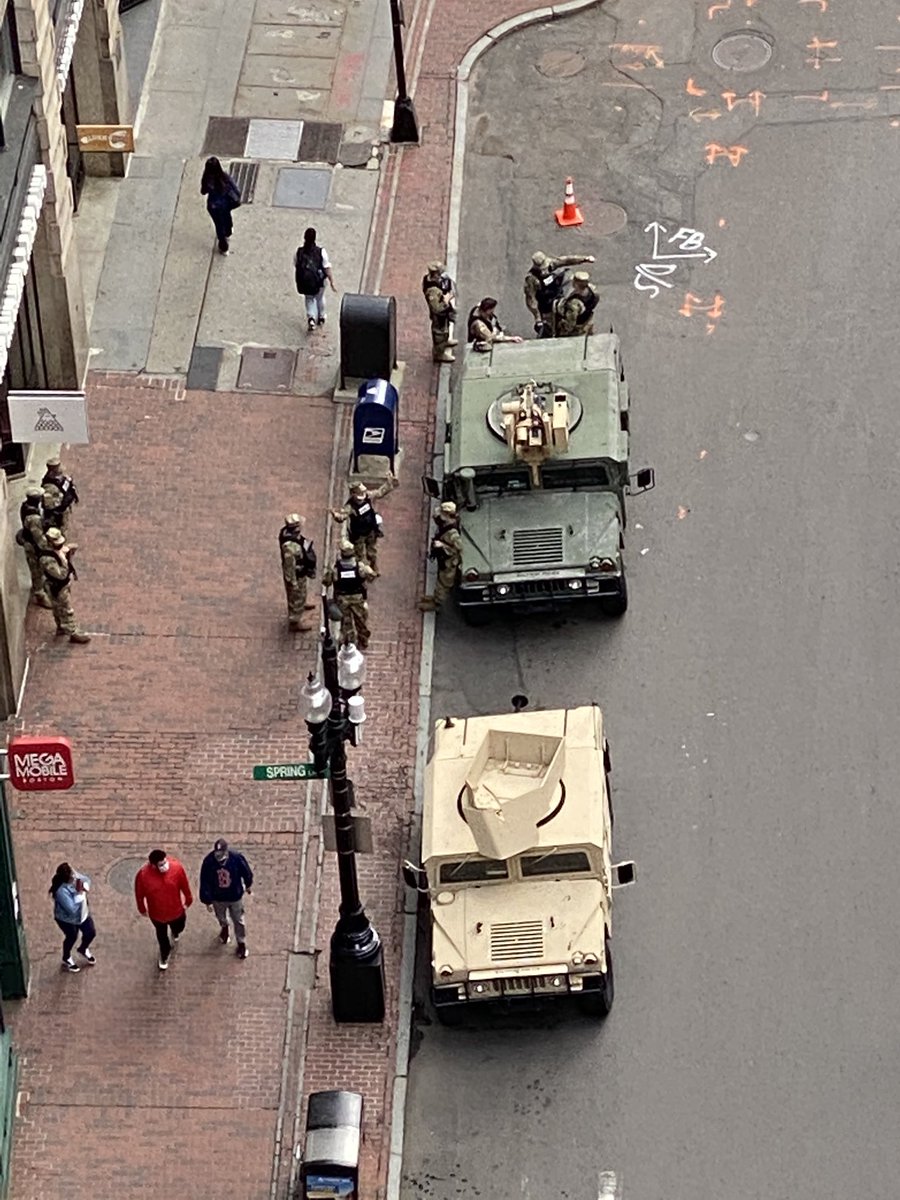 Kando_Can's tweet photo. The National Guard and BPD on Washington st in Downtown Crossing. #BostonProtests https://t.co/W3entAzeLg