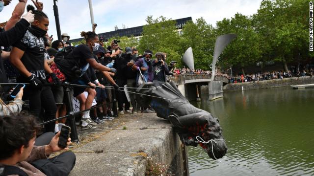 Anti-racism protesters in Bristol, England, pulled down a statue of 17th century slave trader Edward Colston and dumped it into the nearby harbor. Police say they are looking at video footage to identify the people responsible. 
cnn.it/2APqu3b