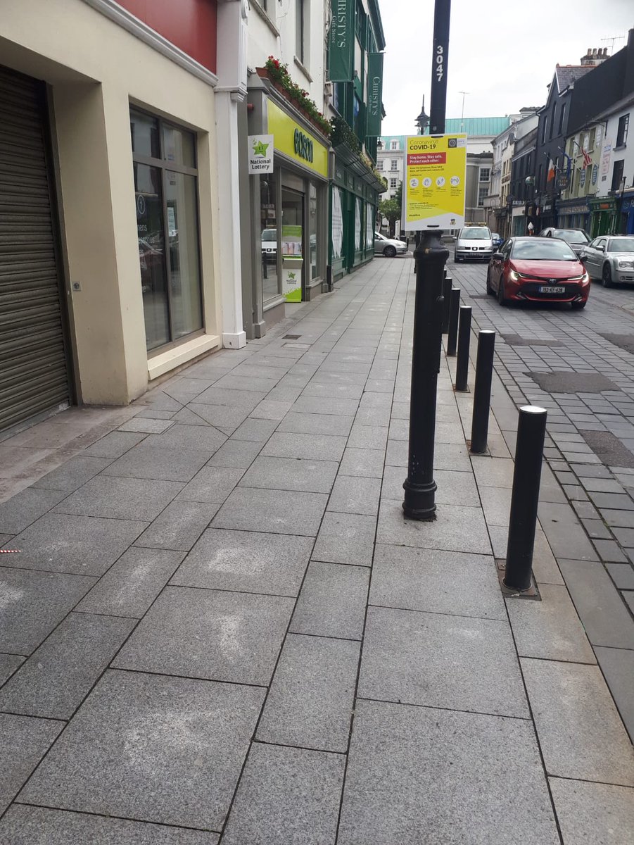countykerry's tweet photo. Social distancing signage up in Killarney town as part of Kerry County Council's Safe Streets programme, ahead of tomorrow's reopening of retail businesses. #safekerry https://t.co/Lt4OxUKJUH