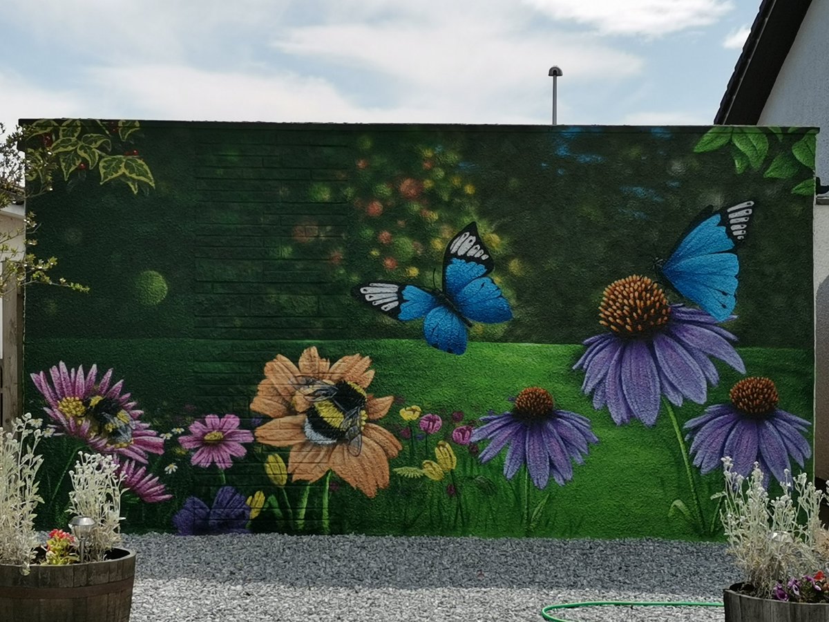 Day 83. Saw this beautiful garden mural on today's walk. Painted by a local artist. What an incredible talent!