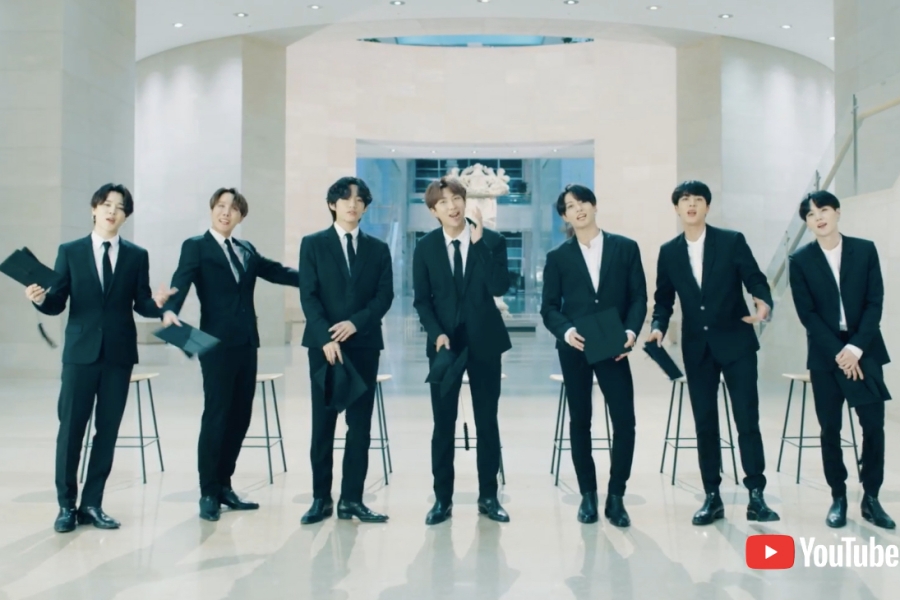 soompi's tweet photo. WATCH: #BTS Delivers Moving Speech For YouTube's Virtual Graduation Ceremony #DearClassOf2020 https://t.co/kIa97ayqqF https://t.co/KlkZnNq9sa