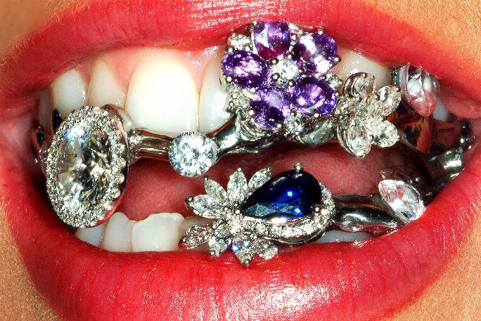 Fun Fact: The Grillz Katy Perry Has In Her Mouth In The Dark Horse