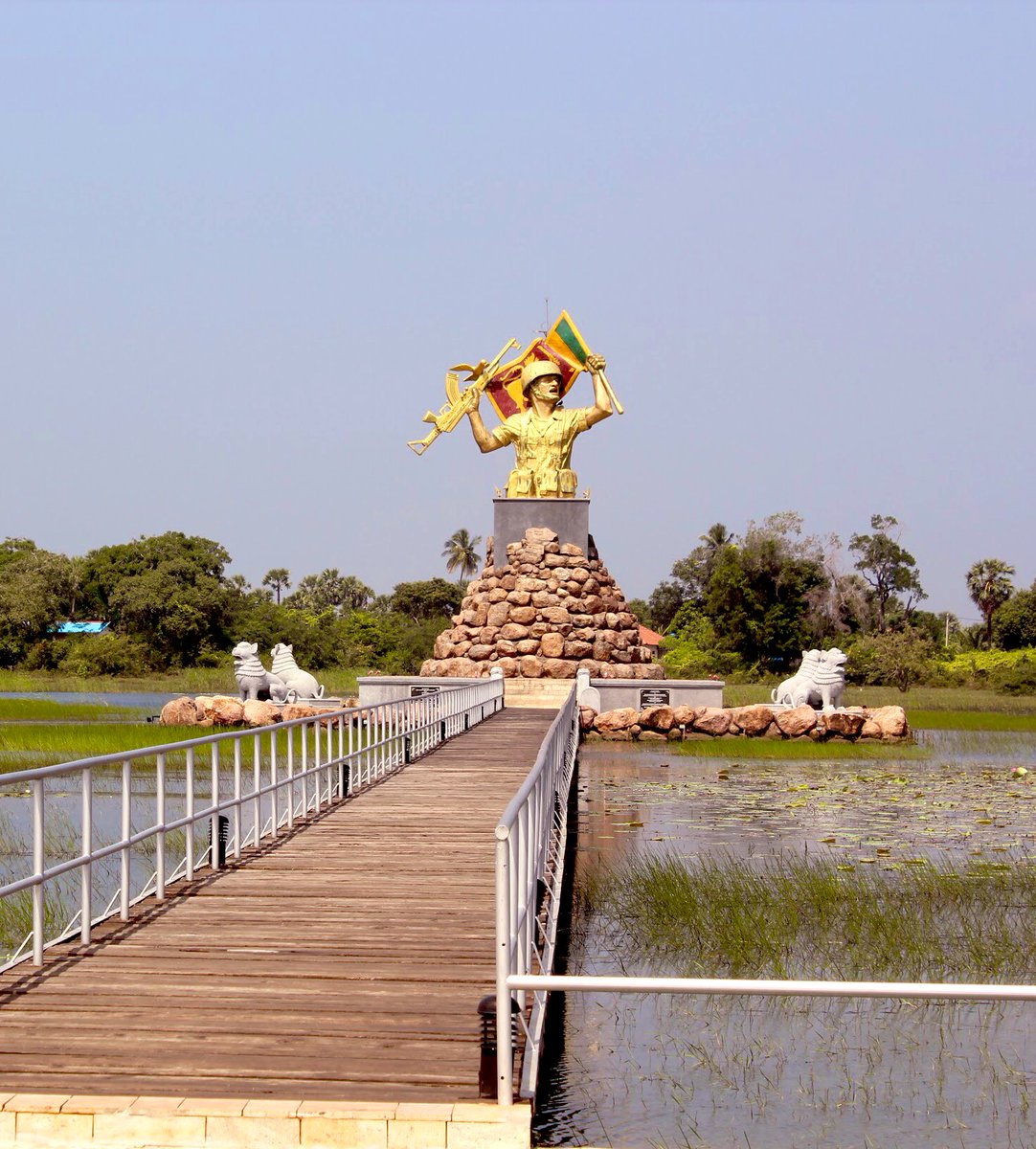 In Puthukudiyiruppu, Mullaithivu. A victory monument. Conveniently located in a pond, so if you tear it down you can dump it straight in the water
