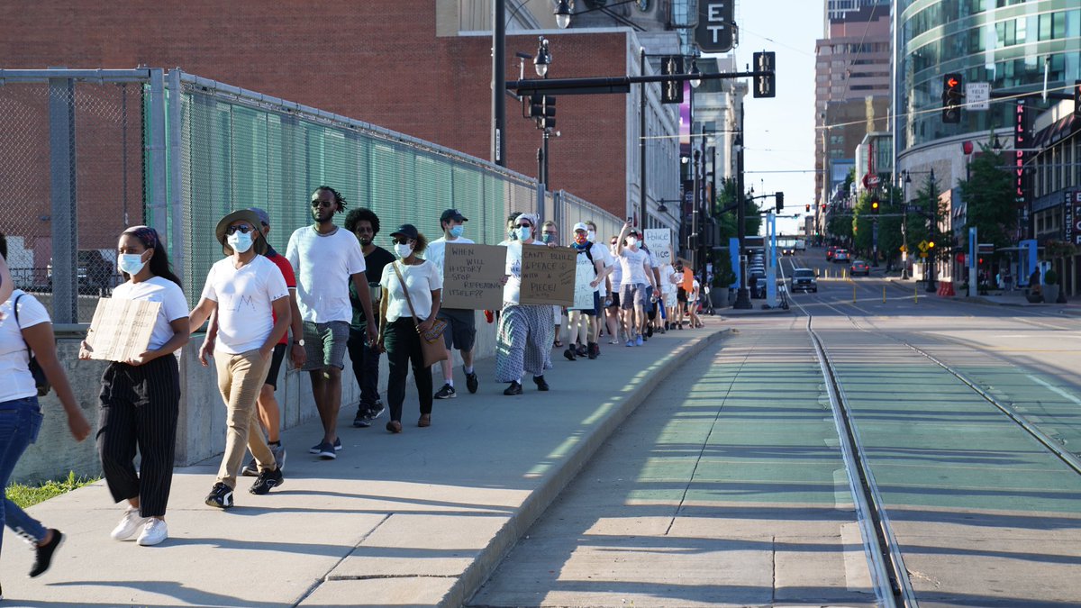 TheFastPitch's tweet photo. The Silent March has made it downtown https://t.co/iCnw7pgUNu