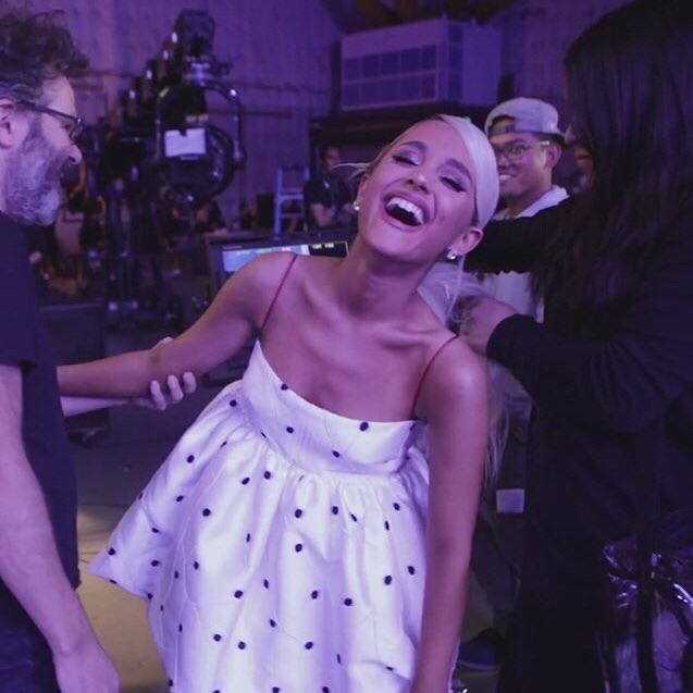ariana grande smiling but her smile gets bigger as you keep scrolling; a thread