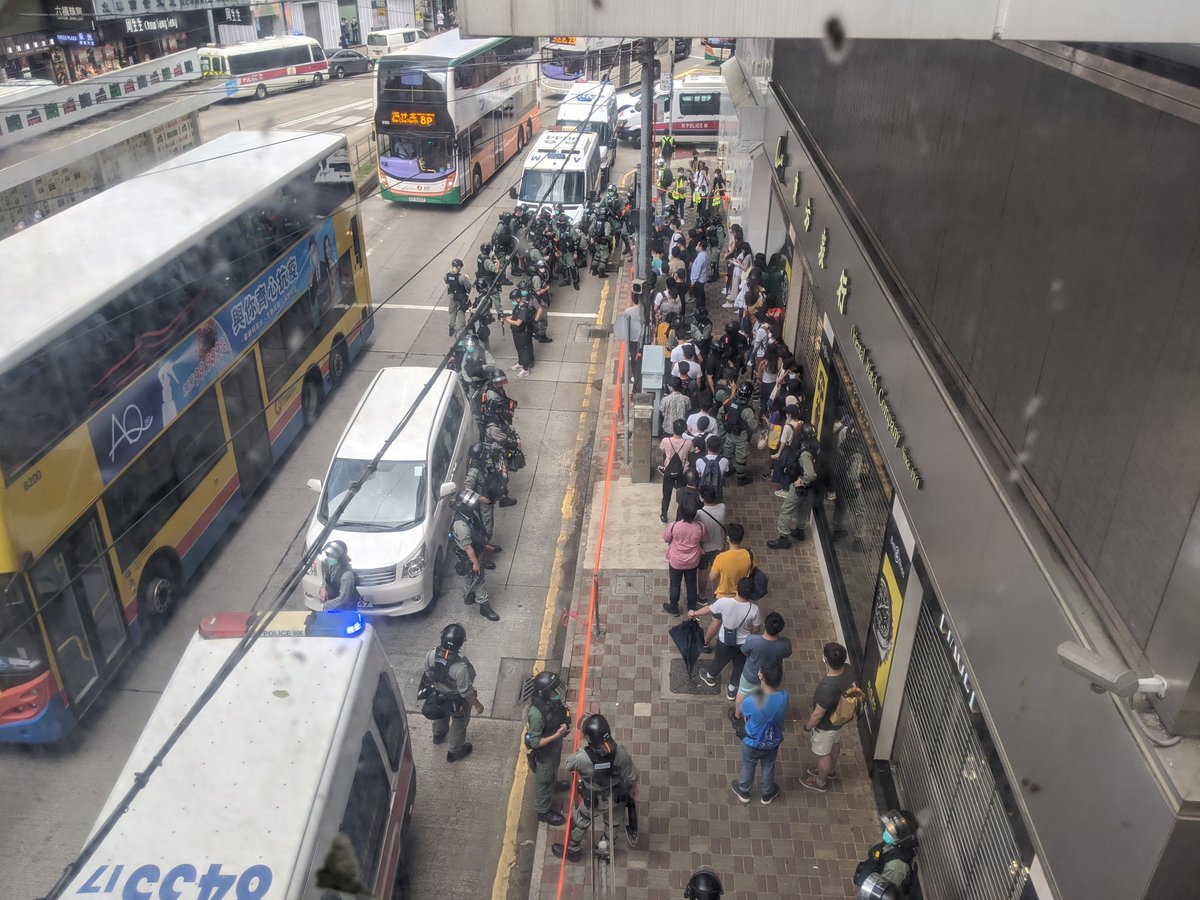 Appears I was too optimistic. Of this round-up, a small initial batch was allowed to leave. But dozens are presumably arrested and taken onto police vehicle: exact number unclear, but it took at least 2 vans.