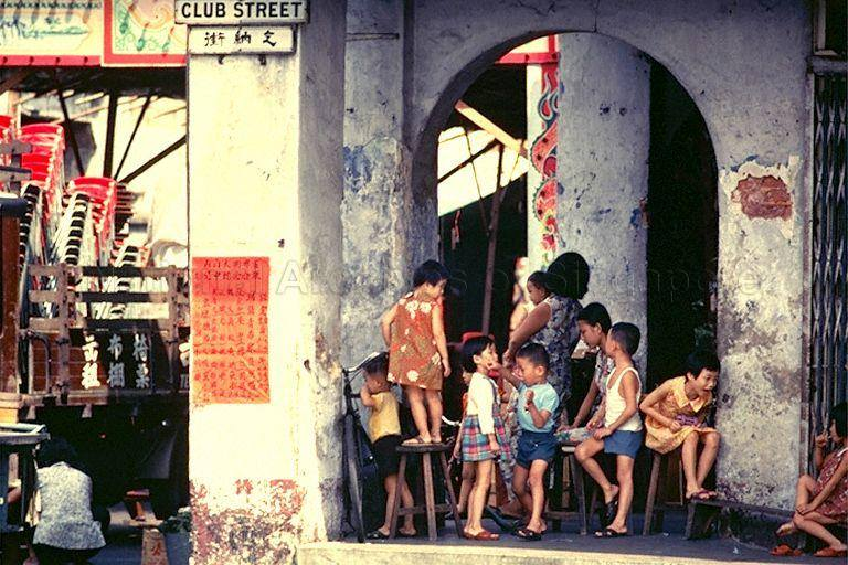 It is also a space for the neighbourhood children to play while their parents keep a close eye on kids. The adults would also pull out their chairs and catch up with one another on the latest news (National Archives of Singapore, 1972) (2/n).