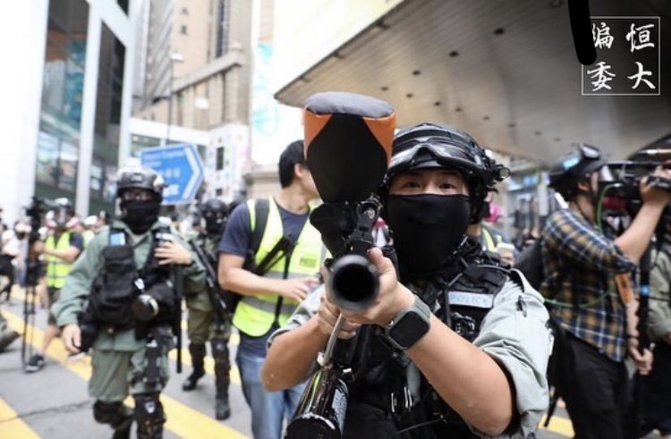 antielabhk's tweet photo. Pointing your gun at the journalist’s camera at a point-blank range won’t give you a cool look, it’ll just make you look extra ridiculous and detestable.

Source: hsuhksueb https://t.co/yHMOOpeZxI