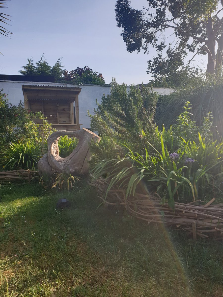 OrlaHand's tweet image. Our beautiful garden that my husband has created he made all the flower bed edging by hand with tree cuttings from our neighborhood and painted the wall murals 🌼🥀🌳 It's a truly wonderful space #BloomwithRTE #gardening #repurposing