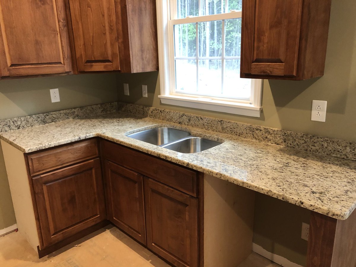 ecg_upstate's tweet photo. Here is another staple in the kitchen design world, Giallo Ornamental granite. A great option for those with dark toned natural wood cabinets. The white base of the material adds enough contrast while the earthy tone flecks tie the light and dark tones together. https://t.co/o3eBaSnuYY