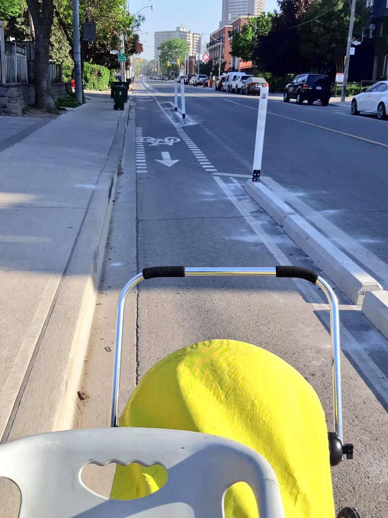 RiversideBIA's tweet photo. Kudos to the folks putting in the new bike lanes curbs today on River Street in our neighbouring @CorktownTO! Excited for all the other cycling improvements to come in #toronto #BikeTO #RiversideTO https://t.co/GLIBrVOfTd