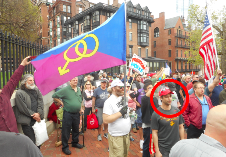 13/ Here's Hourani at the 5/4 event, with Brandon Navom carrying the Straight Pride flag behind him.