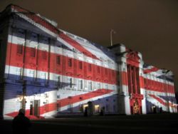 an old photo of Buckingham Palace looking splendid as always but even more so here