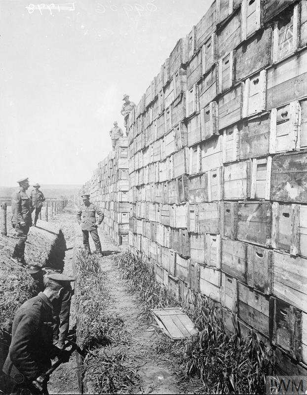 ThisDayInWWI's tweet photo. May 27 1918 #OnThisDay in #WWI war photographer #DavidMcLellan takes these pictures of the incredible logistics of the Allied war effort, here a seemingly endless petrol dump at Beaurainville. Each box contains 4 jerry cans of fuel.
IWM (Q 9936), IWM (Q 9937) https://t.co/DFW4Zvd5DN