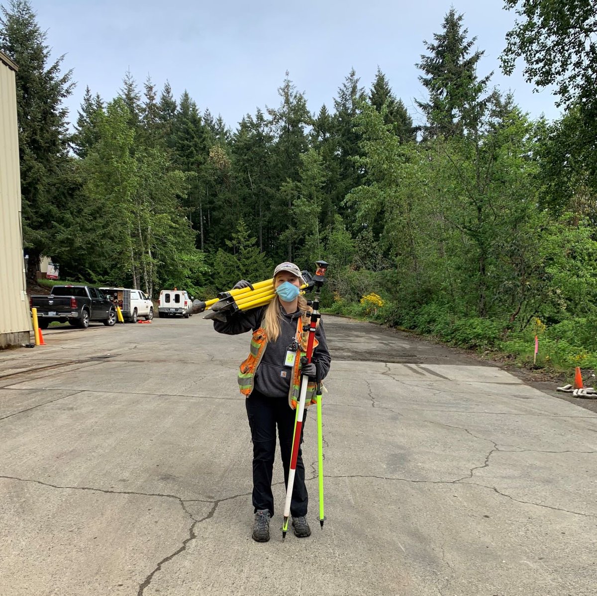 Parametrix_Inc's tweet photo. Field crews at Parametrix are continuing to serve our clients safely by wearing masks and practicing social distancing. This shot of surveyor Jade Austin was captured at the Silverdale Recycling and Garbage Facility redevelopment project in Kitsap County, WA. https://t.co/nzaklllTOA