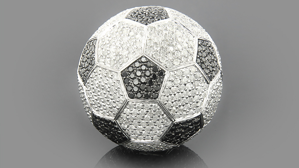 GIA on X: Gooooooooooooooooal! This black and white diamond soccer ball  delivers visual kick. Black diamonds look black because of their graphite,  pyrite and hematite inclusions. Learn more about black diamonds on