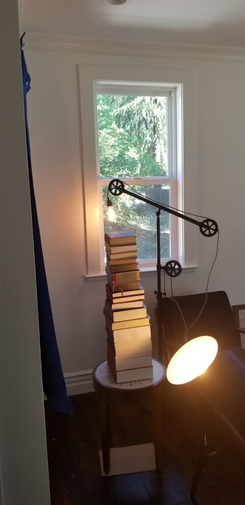 Gehrett's tweet image. Getting ready for our Samsung Solve for Tomorrow Pitch at 10:20 AM (PST) in our makeshift home studios (notice the huge pile of books to make a laptop stand).  Go Team!  #SamsungSolve #ChawanakeeProud