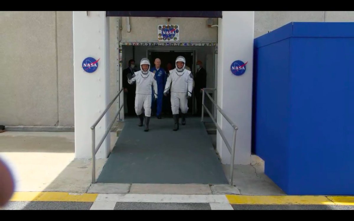 The DM-2 astronauts have left the historic Neil Armstrong checkout building and climbed into their Tesla's for the ride to pad 39a! #SpaceX  #DM2  #LaunchAmerica