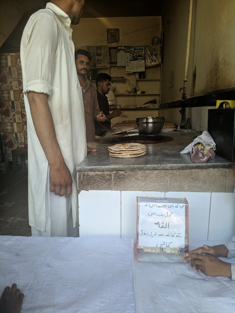 KashifWajid's tweet photo. A little step goes a long way. My neighborhood tandoor wala was collecting donations to give underprivileged people free bread to eat. And it was good to see people were donating #HelpUsGetBack #coronavirusinpakistan https://t.co/aDCbONOw0e
