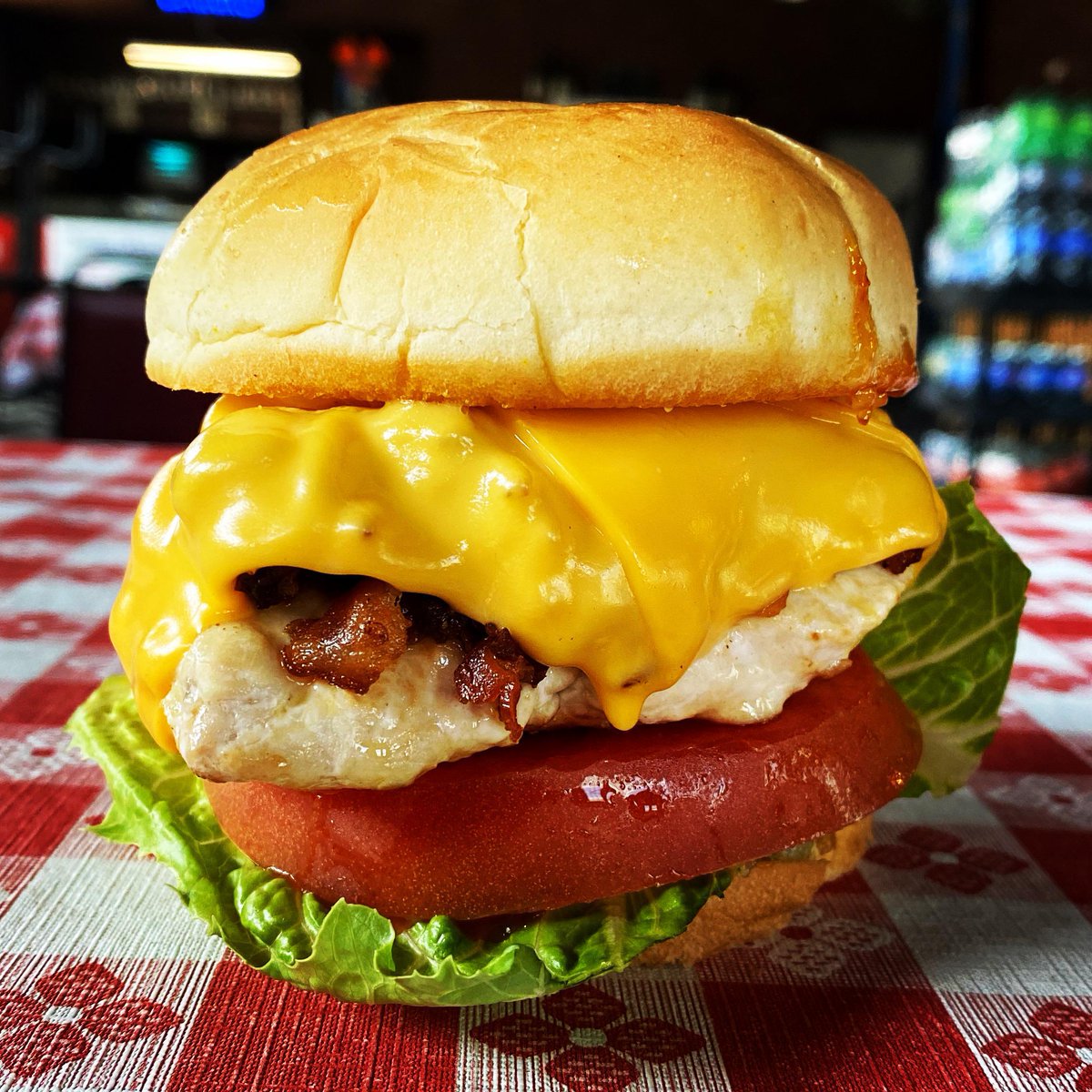 Kazia_Raes's tweet photo. Kazia Rae's Restaurant's Chicken BLT is made with never-frozen skinless chicken breast. Topped with four slices of chopped bacon (so you can enjoy bacon in every bite) and two slices of Melted American Cheese (holds the bacon in place). Served on a buttered grilled potato roll (G https://t.co/eJ4QZfYtXd