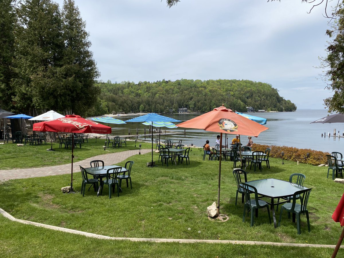 fredandfuzzys's tweet photo. It is cherry blossom and cherry margarita season. Umbrellas up! We are open! #DoorCounty https://t.co/rpbAsdFAOe