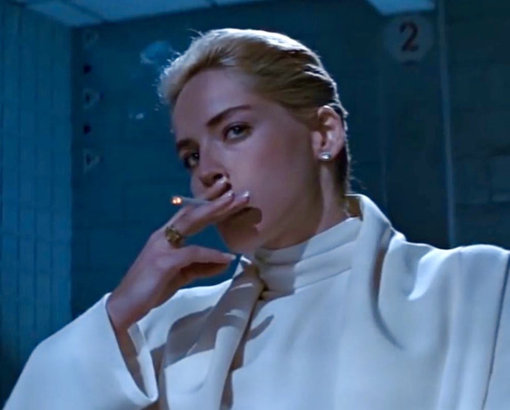 basic instinct (1992)gucci by tom ford (1994-2004)sleek, sexy, & dark: ford’s gucci was made for daring femme fetales, & this erotic thriller’s iconic fashing scene fits the scandalous campaigns ford did for the house. stone is the devil in a white dress— the ford/gucci woman.