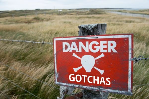 A minefield “danger mines” sign that has been edited to say “Danger Gotchas”