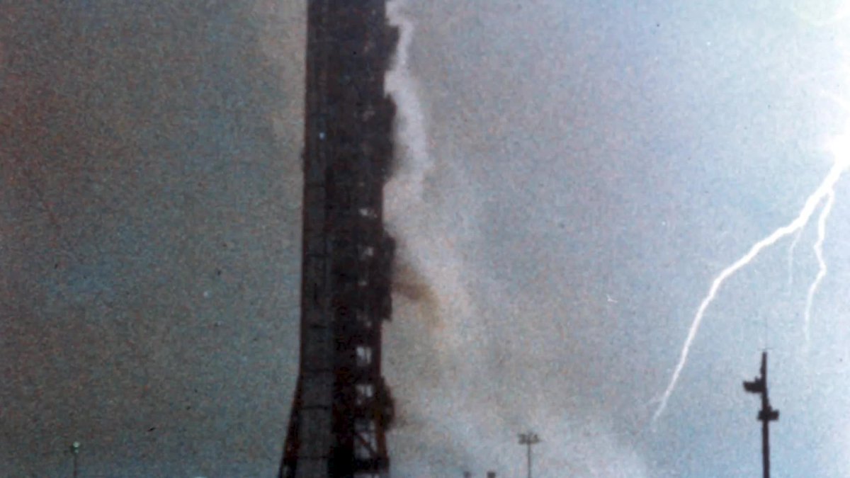 Rockets have been hit in flight by lightning before! Apollo 12's Saturn V was struck twice on launch in 1969. Ascending in the middle of a rainstorm, the ionized exhaust plume allowed a discharge to zap through the rocket and down to the pad, almost ending the mission.
