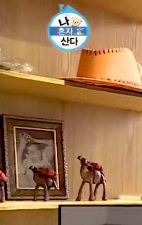 Changmin displaying XV album album on his home DOOR ENTRANCE.