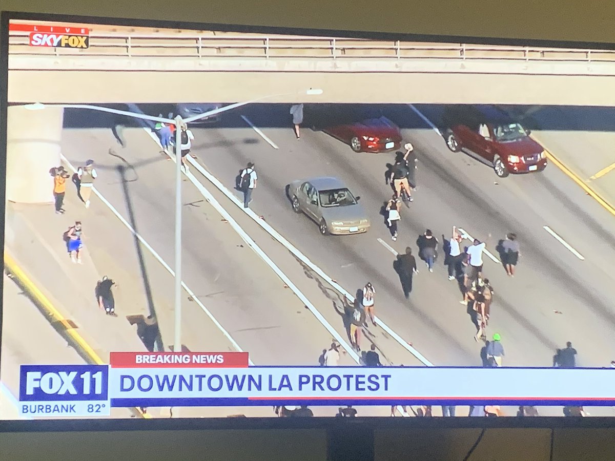 BREAKING: Black Lives Matter protest in downtown LA for  #GeorgeFloyd is spilling onto the 101 freeway and all lanes of traffic are being blocked.  @FOXLA live overhead right now.