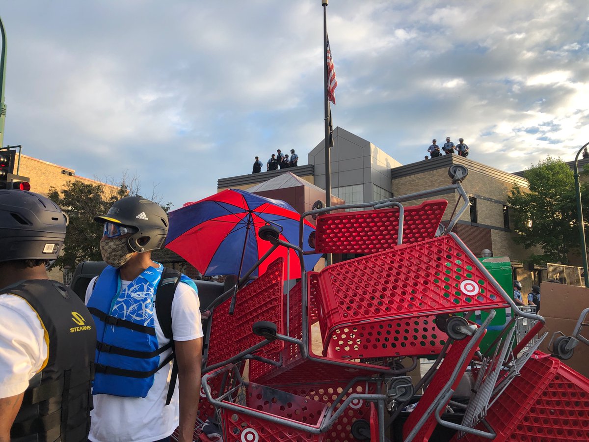 People have erected their own barricade using Target carts
