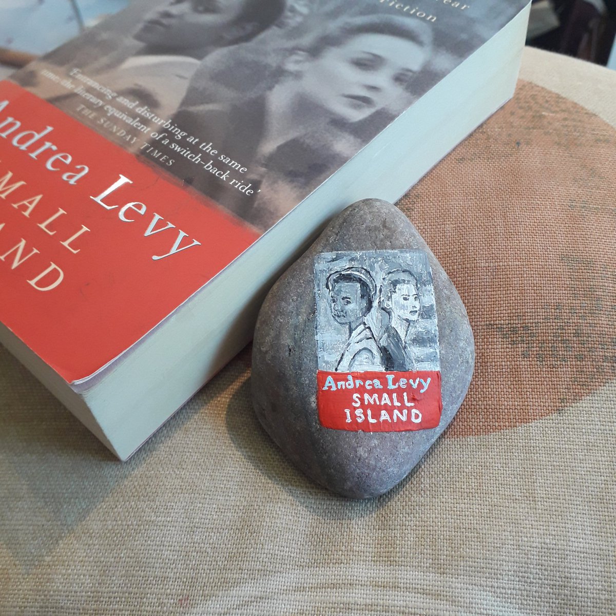 Small Island by Andrea Levy painted on a rock to be hidden in my library  @headlinepg