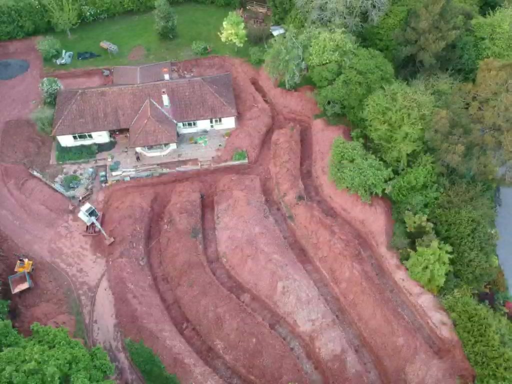 Latest project. Trenches have been dug for the slinky ground array. Four, 30m slinkies will be connected to a Kensa Heat Pumps 13kW Evo Ground Source Heat Pump to satisfy all the heating &amp; hot water needs of this property renovation. <a href="/KensaHeatPumps/">Kensa</a> #groundsourceheatpumps