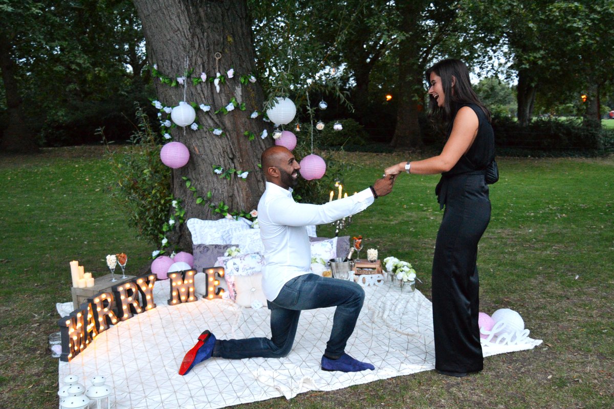 TheProposers's tweet photo. A picnic proposal in Battersea Park 😍 The couple went for a romantic stroll to the park and stumbled across this BEAUTIFUL set up 💕 They had complete privacy on a GORGEOUS hot day and were met with views of the fountains in the park and a playlist of her favourite songs playing https://t.co/3Vd1G0lJaK