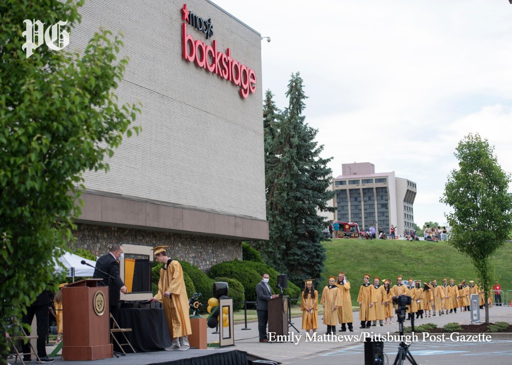 PittsburghPG's tweet photo. Gateway High School held an unprecedented graduation ceremony in the parking lot of the Macy's at the Monroeville Mall to celebrate the Class of 2020.

Parents and families watched from their cars as the students walked the stage to receive diplomas and become graduates. https://t.co/ulvTgeGlAh