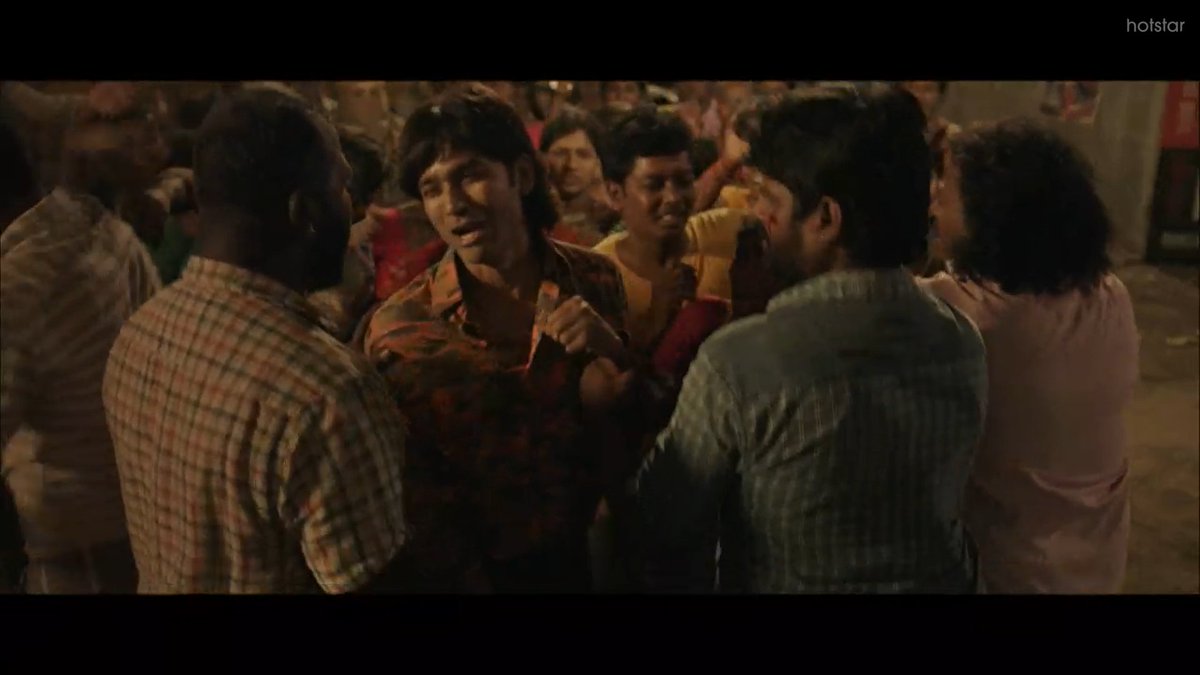 The setup shifts to 1991, when the assassination of an ex-PM occurred. Vetrimaaran humorously portrays the mishap during the period, of robberies, and stuff. Again, such a liberating moment (You know what I am talking about). I mean the whole theater erupted that day!.