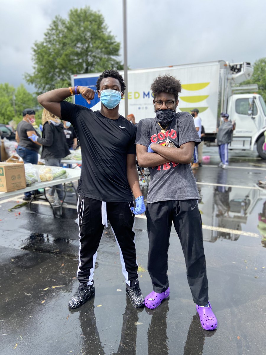 Young black men. Volunteering in the rain. 2020That’s my black boy on the right. That’s his church buddy on the left. Don’t kill them please.  #BlackLivesMatter  